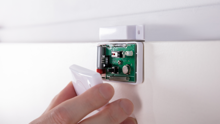 door alarm sensor being installed on business premises.